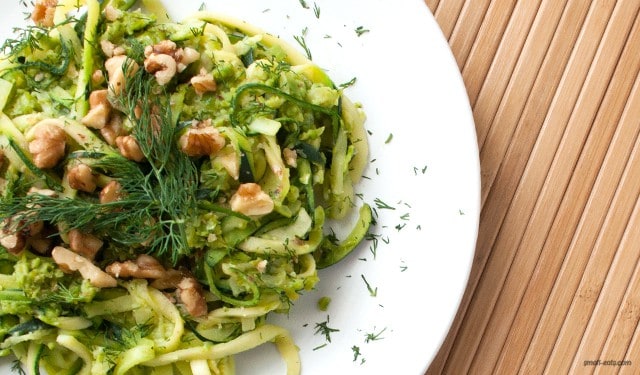 A plant-based zucchini pasta with smashed peas and dill.