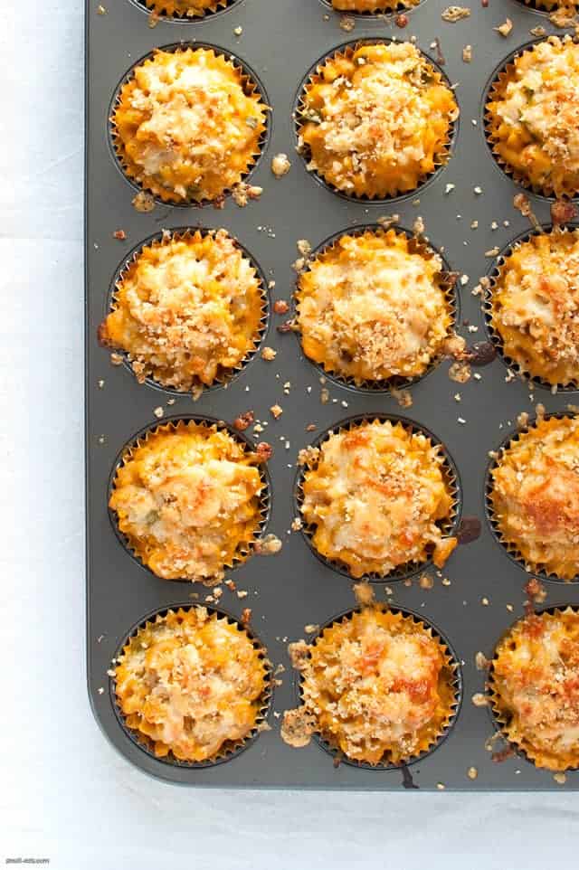 Make your mac and cheese party baked in a muffin tin and vegetable friendly with butternut squash and spinach.