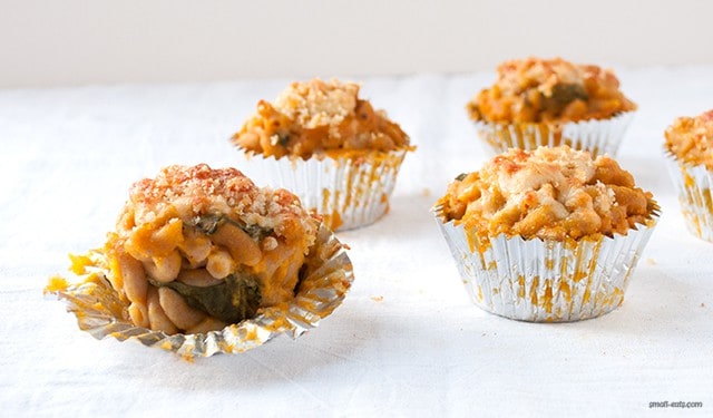 Make your mac and cheese party baked in a muffin tin and vegetable friendly with butternut squash and spinach.