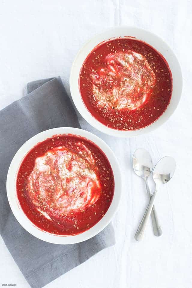 A simple roasted root vegetable soup topped with yogurt and za'atar for a nourishing meal. | Roasted Beet Carrot Soup from small-eats.com