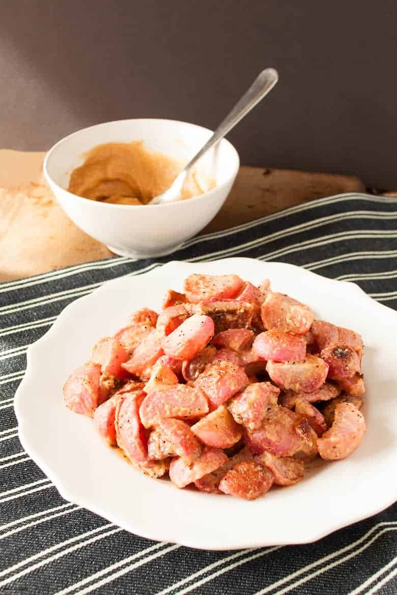 A quick and simple roast radish dish mixed with tahini. | Roasted Radishes with Tahini from small-eats.com 