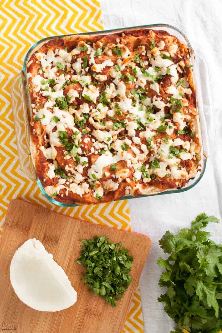 A filling, Mexican inspired casserole filled with black beans, kale, and mushrooms. | Greens and Beans Tortilla Casserole from small-eats.com 