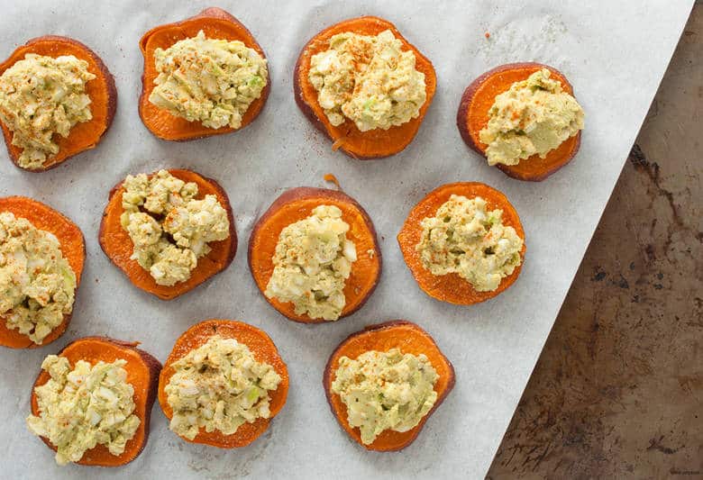 A paleo and avocado twist on egg salad on crackers perfect for snacking, entertaining, or a meal. | Huevocado Sweet Potato Toast from small-eats.com