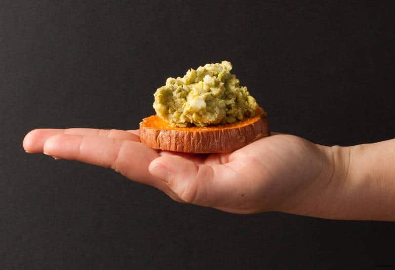 A paleo and avocado twist on egg salad on crackers perfect for snacking, entertaining, or a meal. | Huevocado Sweet Potato Toasts from small-eats.com 