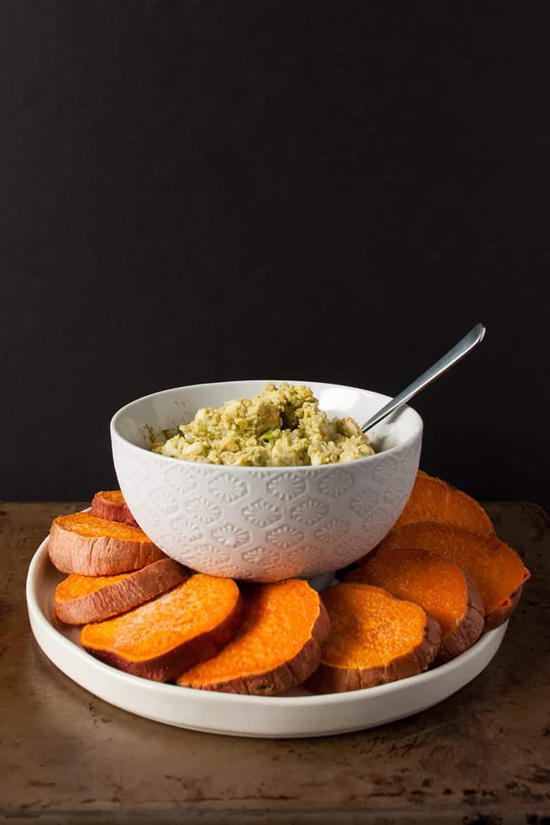 A paleo and avocado twist on egg salad on crackers perfect for snacking, entertaining, or a meal. | Huevocado Sweet Potato Toasts from small-eats.com 