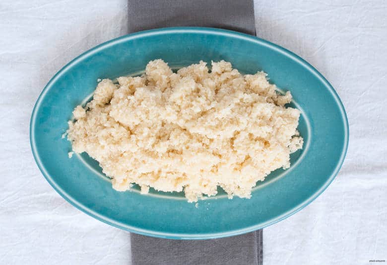 An easy recipe on how to make paleo-friendly, grain-free, gluten rice swap using cauliflower. | Cauliflower Rice from small-eats.com