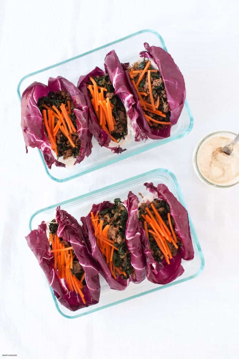 A portable, grain-free way to enjoy ground beef that's also packed with greens and carrots, topped with a tahini dressing. | Beef Radicchio Cups with Tahini Dressing from small-eats.com 