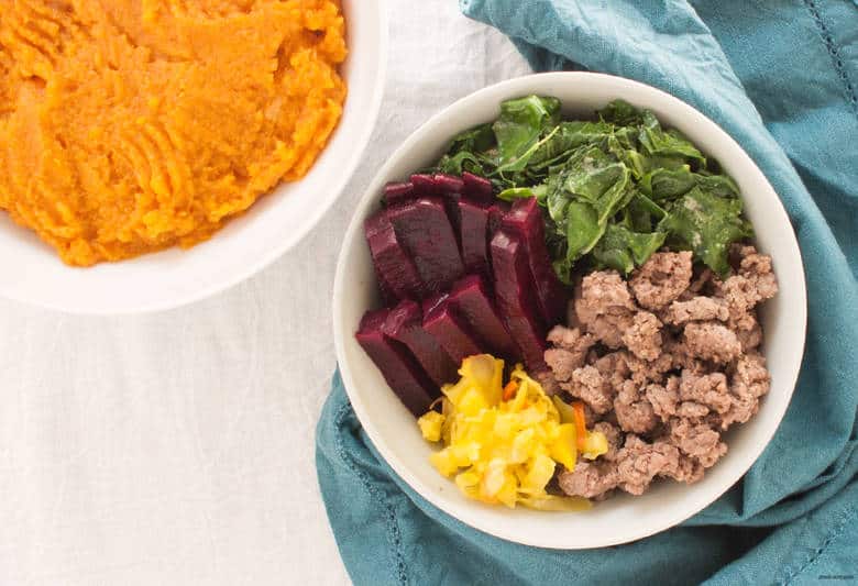 Cozy up with a gluten free bowl packed with fall vegetables and grass fed ground beef. | Paleo Butternut Squash Bowl from small-eats.com