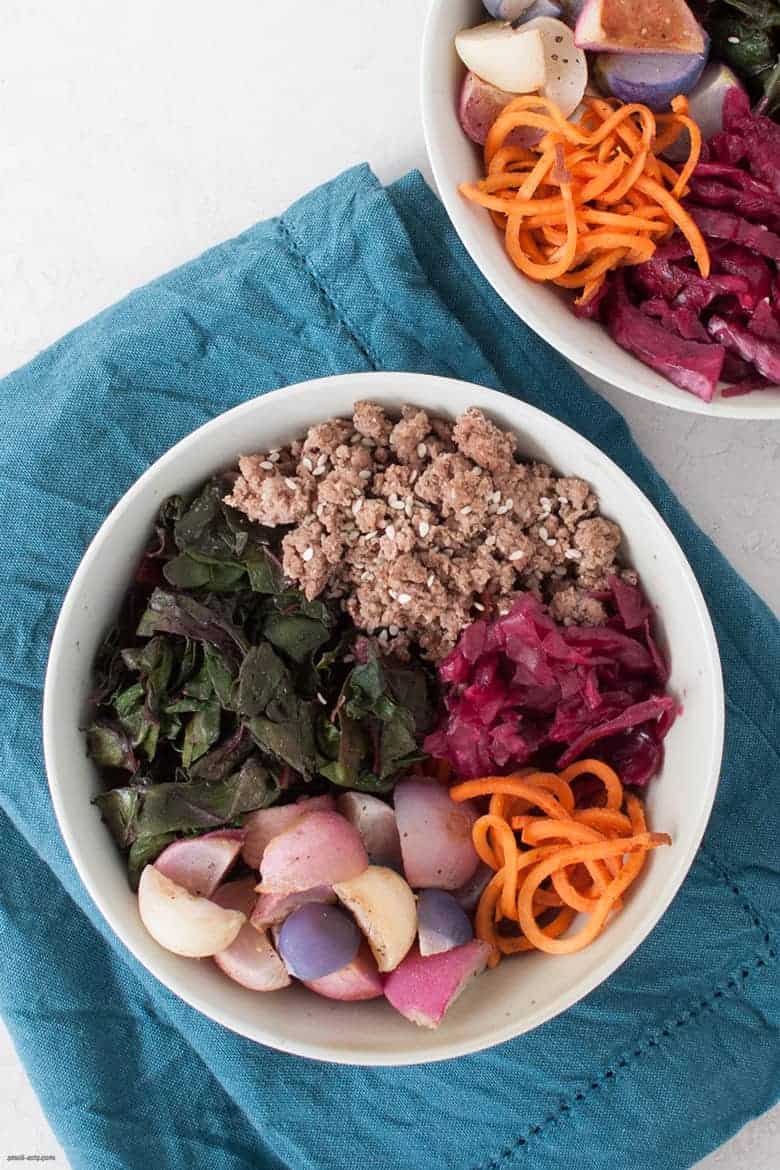 Enjoy a gluten and grain free sweet potato bowl with ground beef, roasted radishes, Swiss chard and sauerkraut. | Beef Sweet Potato Noodle Bowls from small-eats.com 
