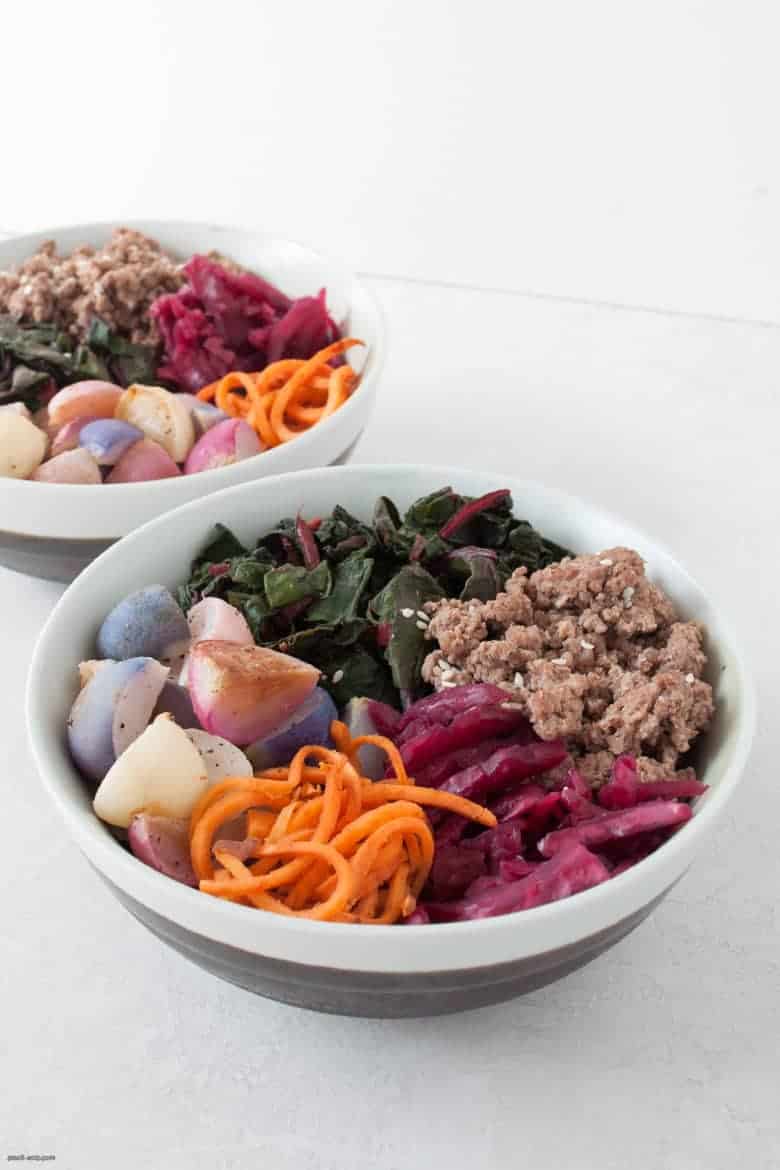 Enjoy a gluten and grain free sweet potato bowl with ground beef, roasted radishes, Swiss chard and sauerkraut. | Beef Sweet Potato Noodle Bowls from small-eats.com 