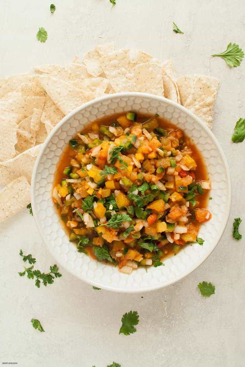 A bright, summery way to add a crunch to your meal and more veggies to your plate with a simple twist on a pico de gallo. | Bell Pepper Pico de Gallo from small-eats.com