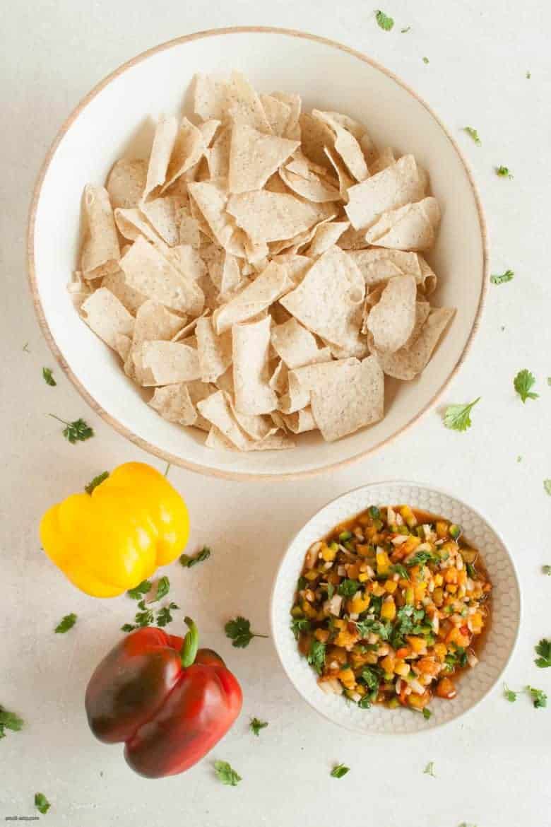 A bright, summery way to add a crunch to your meal and more veggies to your plate with a simple twist on a pico de gallo. | Bell Pepper Pico de Gallo from small-eats.com