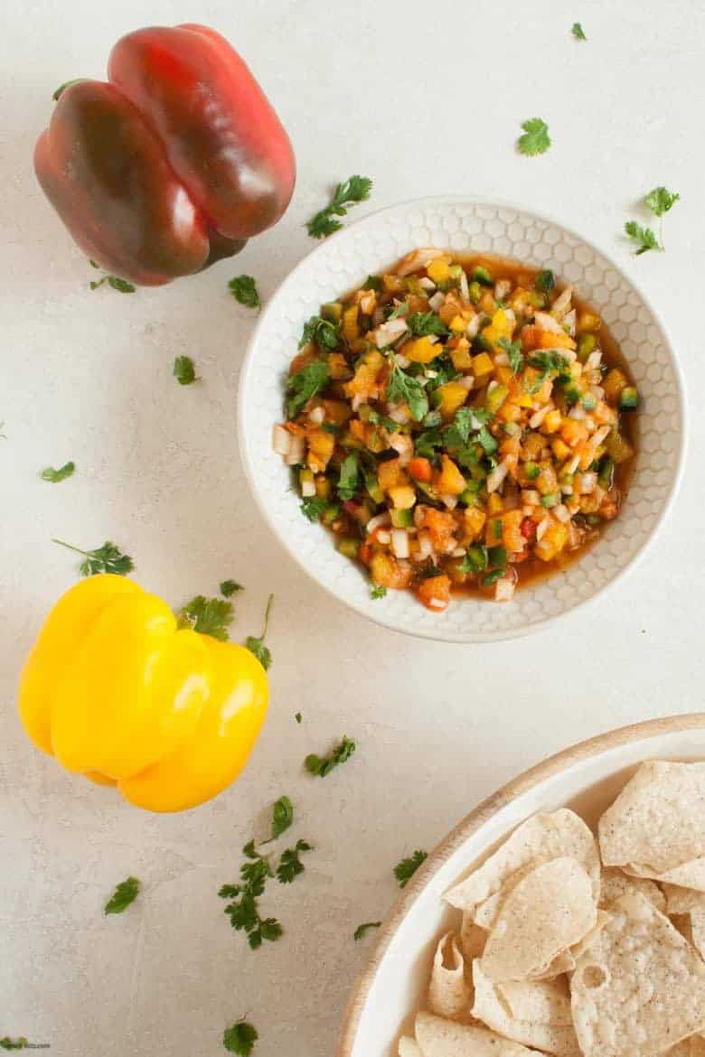 A bright, summery way to add a crunch to your meal and more veggies to your plate with a simple twist on a pico de gallo. | Bell Pepper Pico de Gallo from small-eats.com