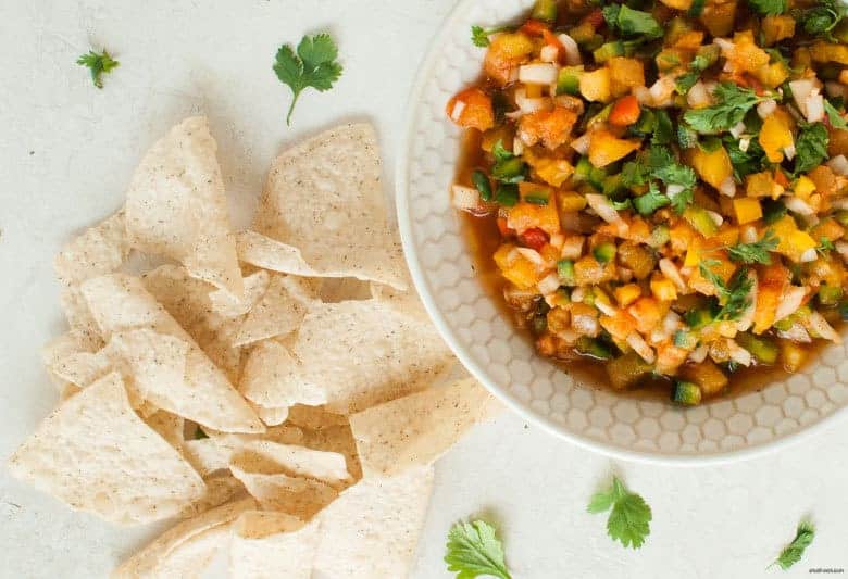 A bright, summery way to add a crunch to your meal and more veggies to your plate with a simple twist on a pico de gallo. | Bell Pepper Pico de Gallo from small-eats.com