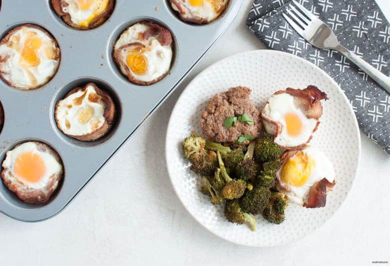 A hearty savory breakfast with eggs, bacon and sausage that's portable, easy to make, and gluten, grain, and dairy free. | Bacon and Egg Muffins with Breakfast Sausage (Gluten Free, Dairy Free) from small-eats.com