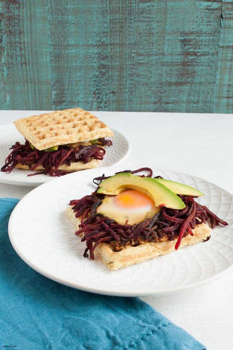 Start off your day with a fun, savory and gluten free breakfast that makes getting your veggies in easy. | Breakfast Egg Nest Sandwiches (Gluten Free) from small-eats.com