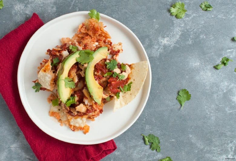 Enjoy a crunchy, spicy and dairy free start to your day with Dairy Free Chicken Chilaquiles. Easy to assemble and enjoy! | Dairy Free Chicken Chilaquiles (Gluten Free) from small-eats.com